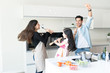 © AntonioDiaz - Family Having Fun While Preparing Food At Home