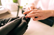©  AnnaHar - Close up image of woman making hardware manicure, nail service industry, fashion salon details, master of manicure.