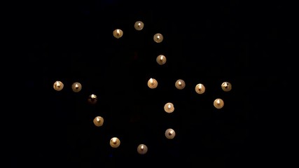 Wall Mural - Diyas decorated candles are lit in Omformation at night.