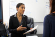 © Tetra Images - Businesswomen talking in office