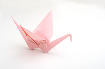 Wall Mural - A single origami crane bird isolated white