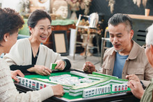 Happy Old Friends Playing Mahjong