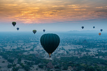 Myanmar, Mandalay Region, Bagan, Hot Air Balloons Flying At Foggy Dawn
