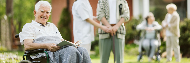 Poster - Elderly spending time in the nursing home garden