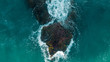 waves hitting rocks at sunny wether , aerial view, view at 90 degrees
costa blanca , alicante , Spain 