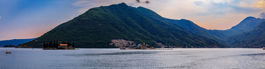 Wall Mural - Panorama of Kotor Bay with Saint George island and man-made island with Our Lady of the Rocks in Montenegro at sunset