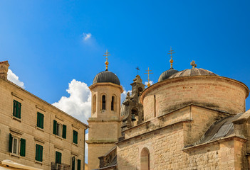 Wall Mural - Stone walls and domes of Church of Saint Luke and Saint Nicholas church in the medieval Old Town of Kotor, Montenegro