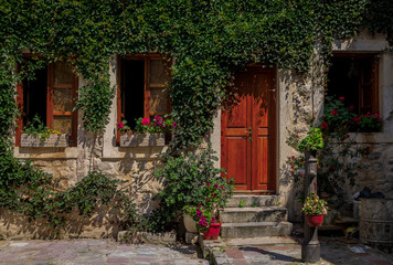 Poster - Ivy-covered old stone house in the well preserved medieval Old town Kotor, Montenegro