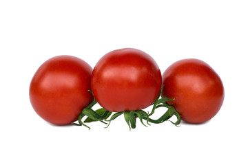 juicy fresh red tomatoes isolated on white background