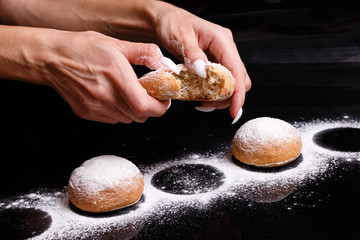 Homemade pastries. White buns are separated by hand. Photo of baking.