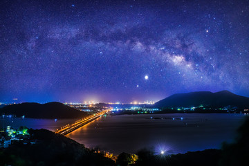 Wall Mural - milky way galaxy, on songkhla lake long exposure photograph, with grain.image contain certain grain 
