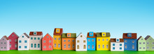 Row Of Wooden Miniature Colorful Retro Houses On Blue Background