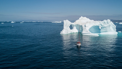 Wall Mural - classic iceberg with arch. amazing sailing in the greenland