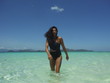 © Ana Andrade - tanned woman beach paradise
