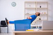 © Elnur - Young male doctor being tired after night shift