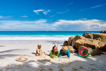 Poster - Family with three year old boy on beach