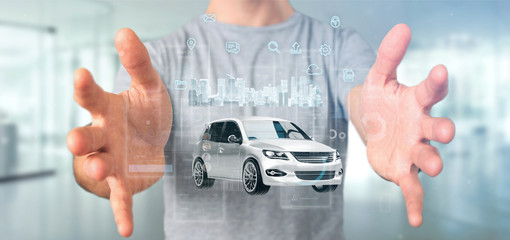 Poster - Businessman holding Dashboard smartcar interface with multimedia icon and city map on a background 3d rendering