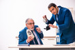 © Elnur - Male employee and cop in police investigation concept
