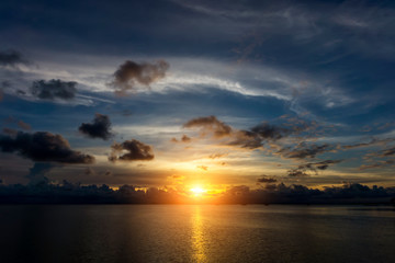 Canvas Print - Sunset sky at the lake with clouds.