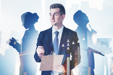 Wall Mural - Man with clipboard and team, financial graph