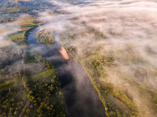 Wall Mural - Fog Over Dunajec River and Countryside in Valley. Lesser Poland at Sunrise. Drone View