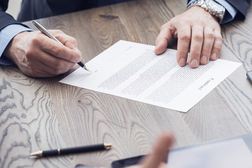 Wall Mural - Businessman signing a contract