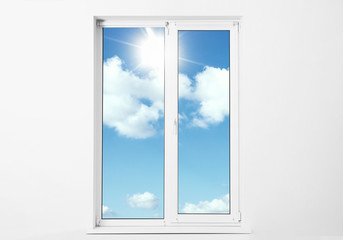  Beautiful view on blue sky with clouds through window