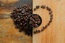 Coffee Beans In The Cup And Coffee Beans Heart