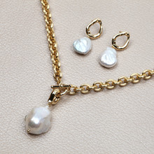 Gold Necklace With White Baroque Pearl Pendant And Earrings