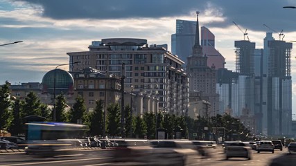 Wall Mural - Traffic on city streets and overpasses, with skyscrapers in the  in the background time lapse