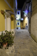  A narrow street between the old houses of San Nicola Arcella, a village in the region of Calabria, Italy.