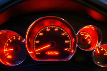 The Glowing Red Speedometer Of A Pontiac G6 With Emblems Removed.