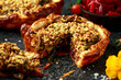 Butternut squash and spinach on beetroot chutney filling in crisp puff pastry vegetarian, vegan pie finished with chestnuts, walnuts and pumpkin seeds