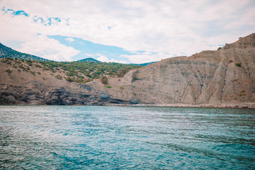 Wall Mural - Beautiful seascape. Amazing composition of nature with mountains and cliffs.