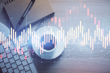 Multi exposure of forex chart drawing and work table top veiw. Concept of financial analysis.