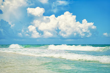 Tropical Beach And Blue Sky With Big White Clouds