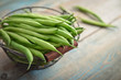 © tashka2000 - Raw green beans in metal basket