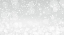 Abstract, Beautiful Snowfall, White Lights Bokeh Celebration, Defocus Glitter Blur On Gray Background. Bokeh Christmas Blurred Shiny.