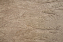 Real Image Of Wet Sand On The Beach With Texture Of Wave.