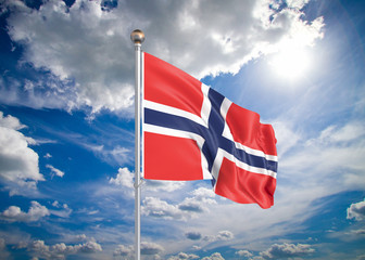 Wall Mural - Realistic flag. 3D illustration. Colored waving flag of Norway on sunny blue sky background.