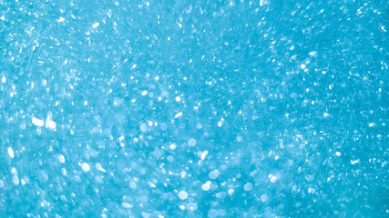 Wall Mural - abstract background blue bokeh circles and dots texture.