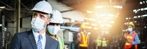 Cuadros en Lienzo Close up face of business engineer manager wear mask in suit and white safety he
