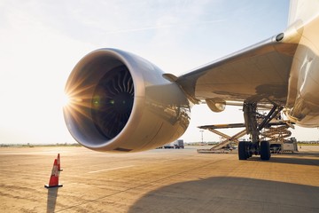 Large jet engine at sunset