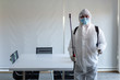 © Pornsak - Staff wear PPE suit cleaning Disinfection at meeting room amid the coronavirus epidemic Professional team disinfection efforts.