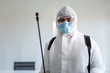 © Pornsak - Staff wear PPE suit cleaning Disinfection at meeting room amid the coronavirus epidemic Professional team disinfection efforts.