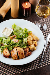 Wall Mural - grilled chicken breast with lettuce and garlic sauce