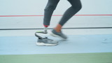 Fototapeta Kuchnia - Woman with prosthetic leg starting to run on track. Jogger training outdoors