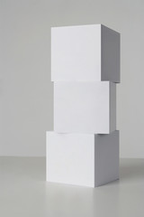 Wall Mural - Three white boxes on a Gray background.

