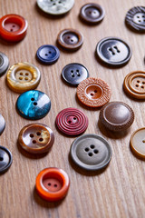 Poster - Background and texture of multicolored antique buttons