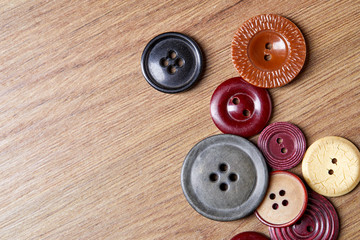 Fototapete - Background and texture of multicolored antique buttons